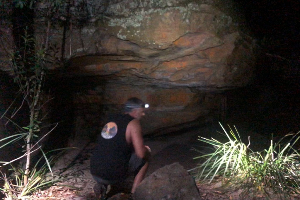 Glow Worm Tour - checking out a rock overhang