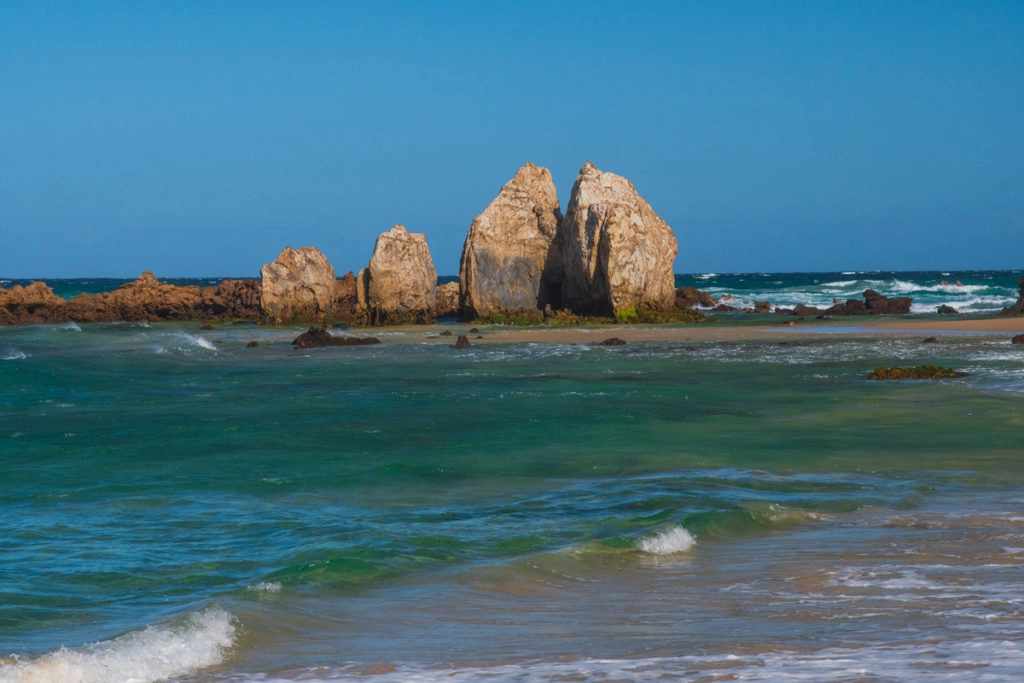 Glasshouse rocks at the southern end of the beach