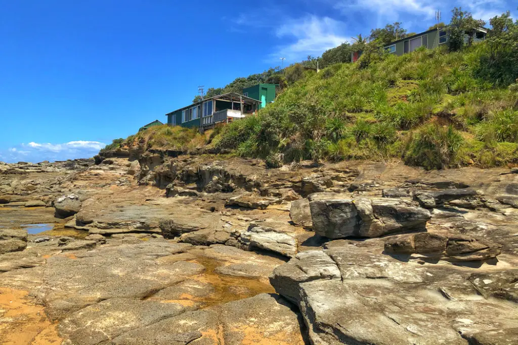 fishing shacks at the southern end of bulgo beach
