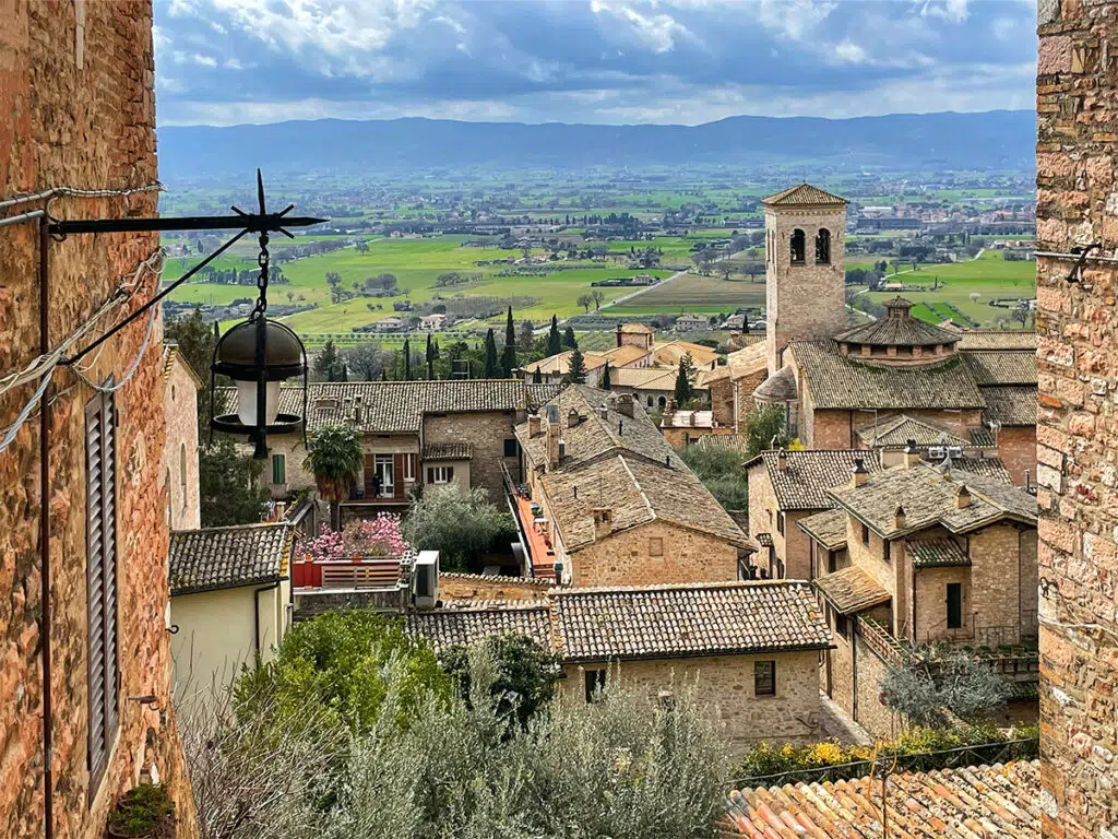 Framed view from Fontabella Street in Assisi