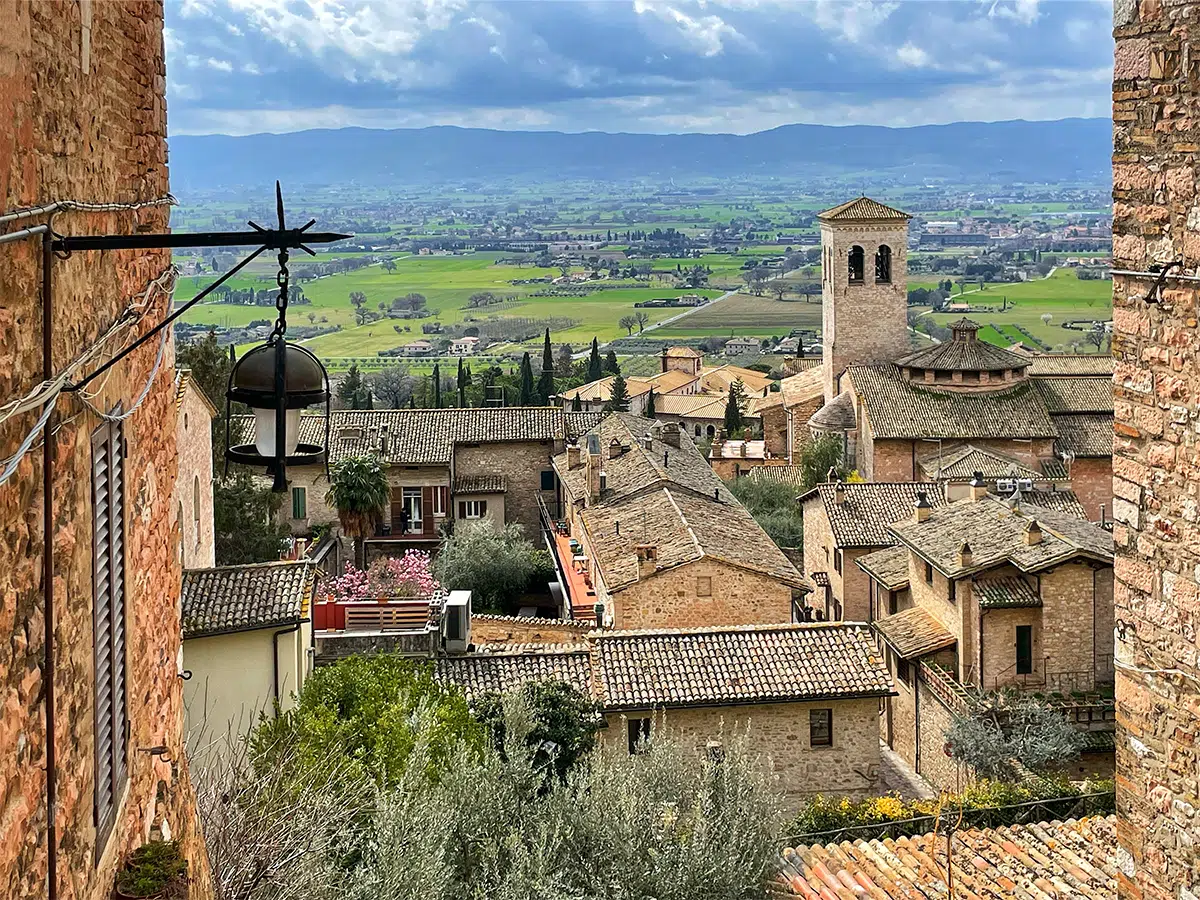 Framed view from Fontabella Street in Assisi