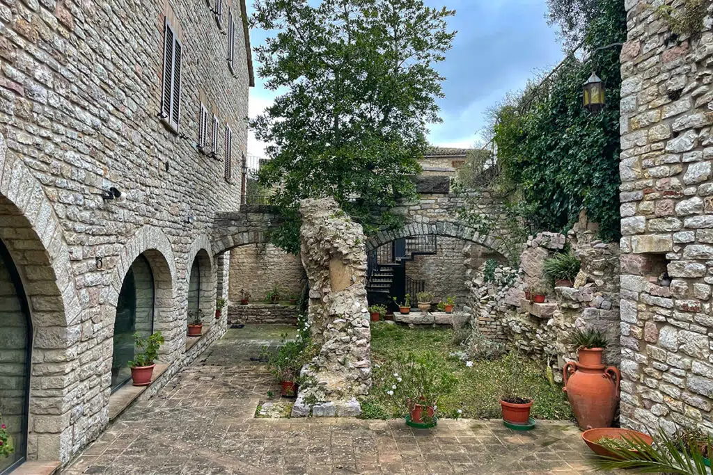 Roman pillar in a private courtyard in Assisi