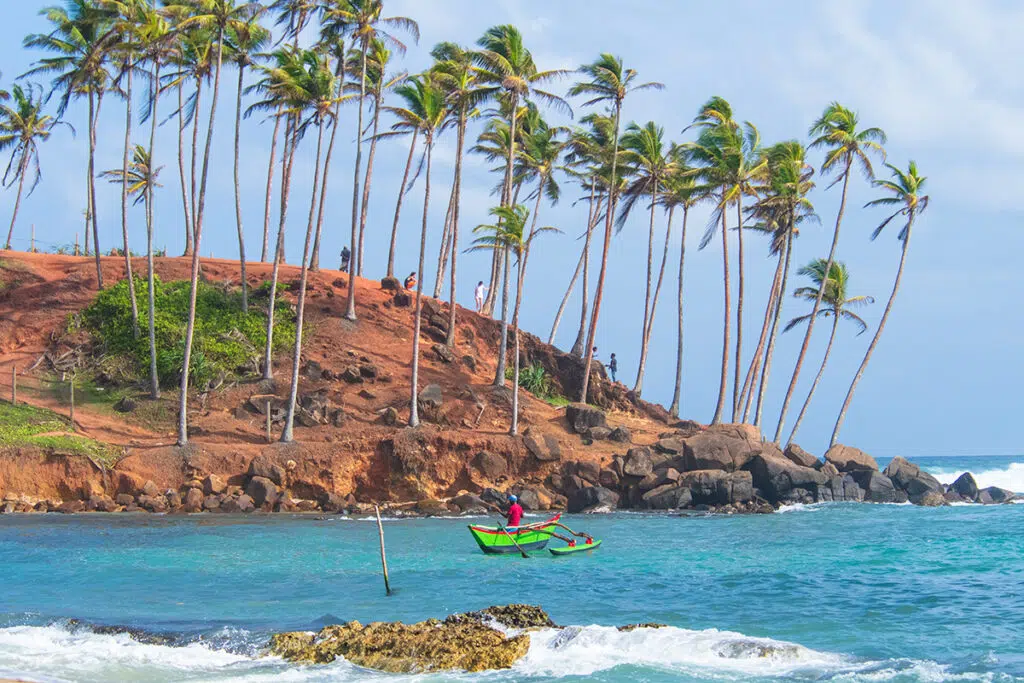 View of Coconut Tree Hill from Turtle Point Beach in Mirissa