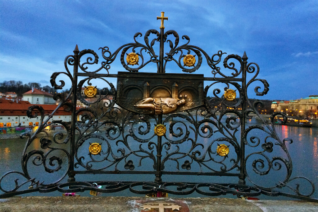 St John Nepomuk plaque on Charles Bridge in Prague